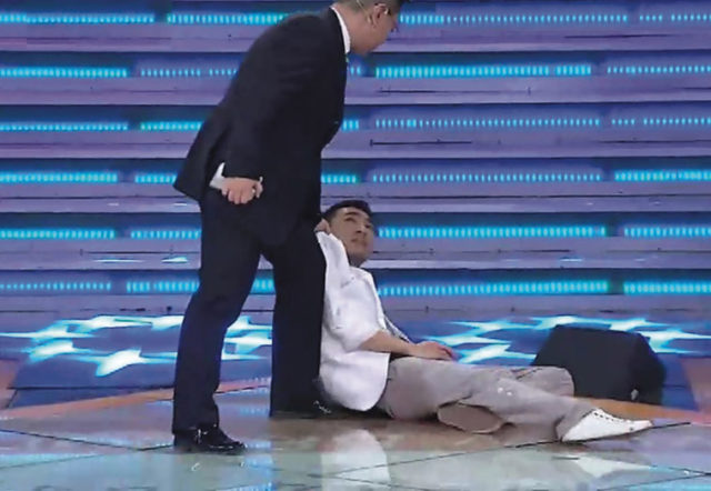 One of the contestants on Only You, a television show based on The Apprentice, collapses under the strain of severe questioning by the judges. Source: ImagineChina