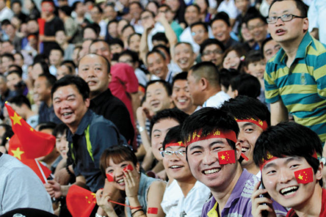 Chinese football fans in Guiyang, Guizhou province, when their national team beat North Korea, June 2011. Source: ImagineChina