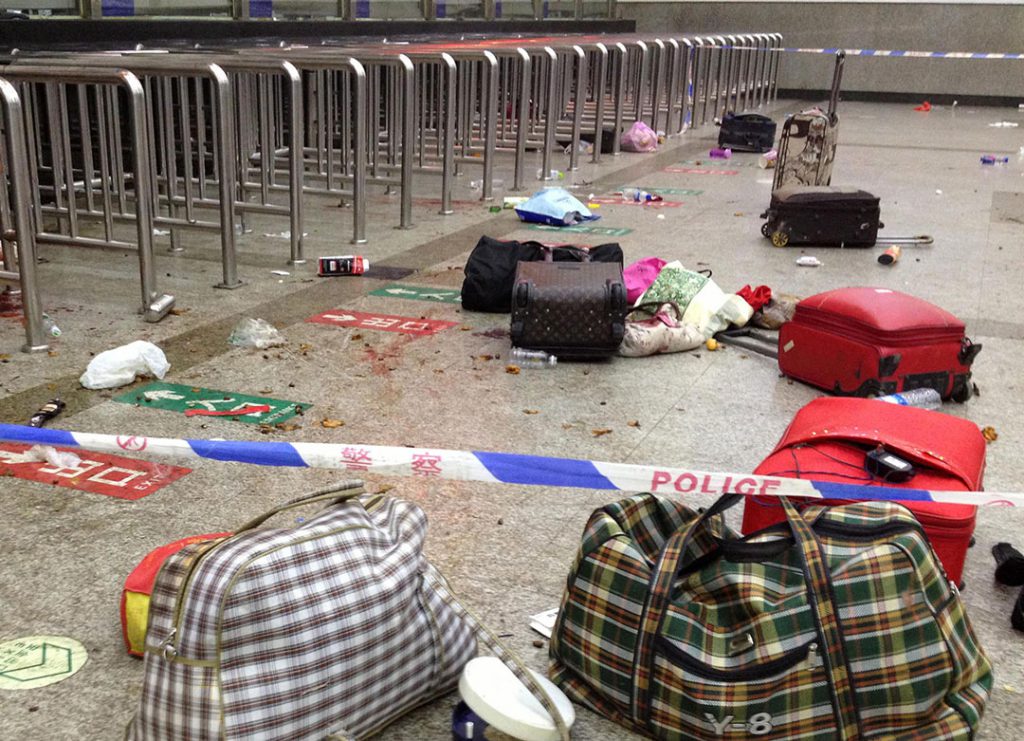 1 March 2014: Six male and two female assailants indiscriminately attack civilians with knives and cleavers at Kunming Railway Station in Yunnan. The attack leaves twenty-nine civilians and four of the suspected killers dead Photo: Xinhua/scmp.com