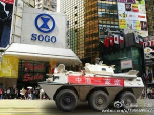 Pro-Beijing protests in Hong Kong: the red banner on the tank reads ‘China and Hong Kong are One Family’ Source: blog.sina.com.cn