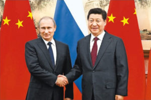 Relations between China and Russia strengthen: Presidents Putin and Xi, shown here at the 2014 APEC Summit held in Beijing. Their growing personal relationship emulates their countries’ converging interests in trade, investment and geopolitics Source: People’s Daily Online